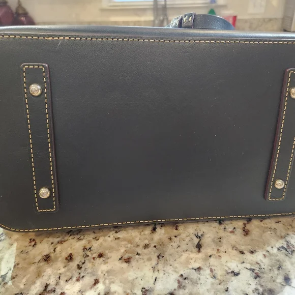 Dooney and Bourke bag. APPROX. 12"wide and 11"tall - Picture 2 of 4